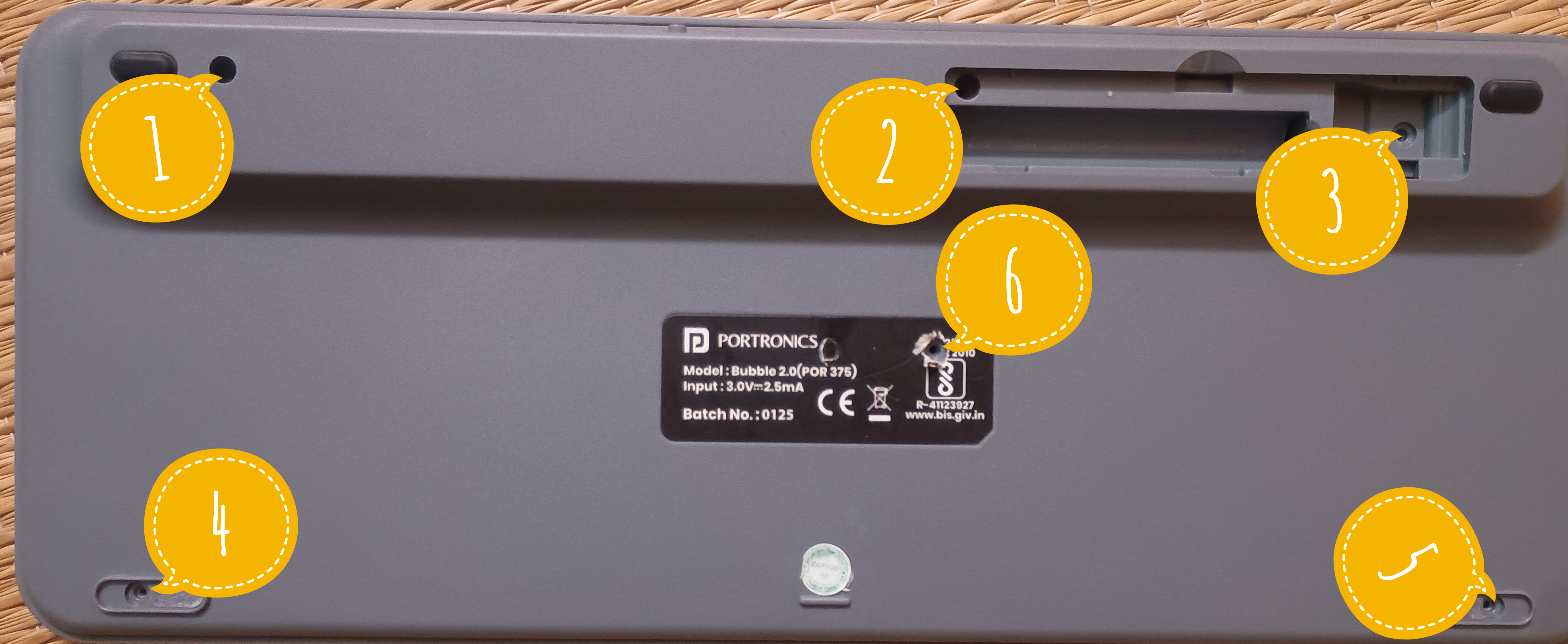 Marked positions of screws 1 to 6 on the back side of the Portronics Bubble 2 keyboard