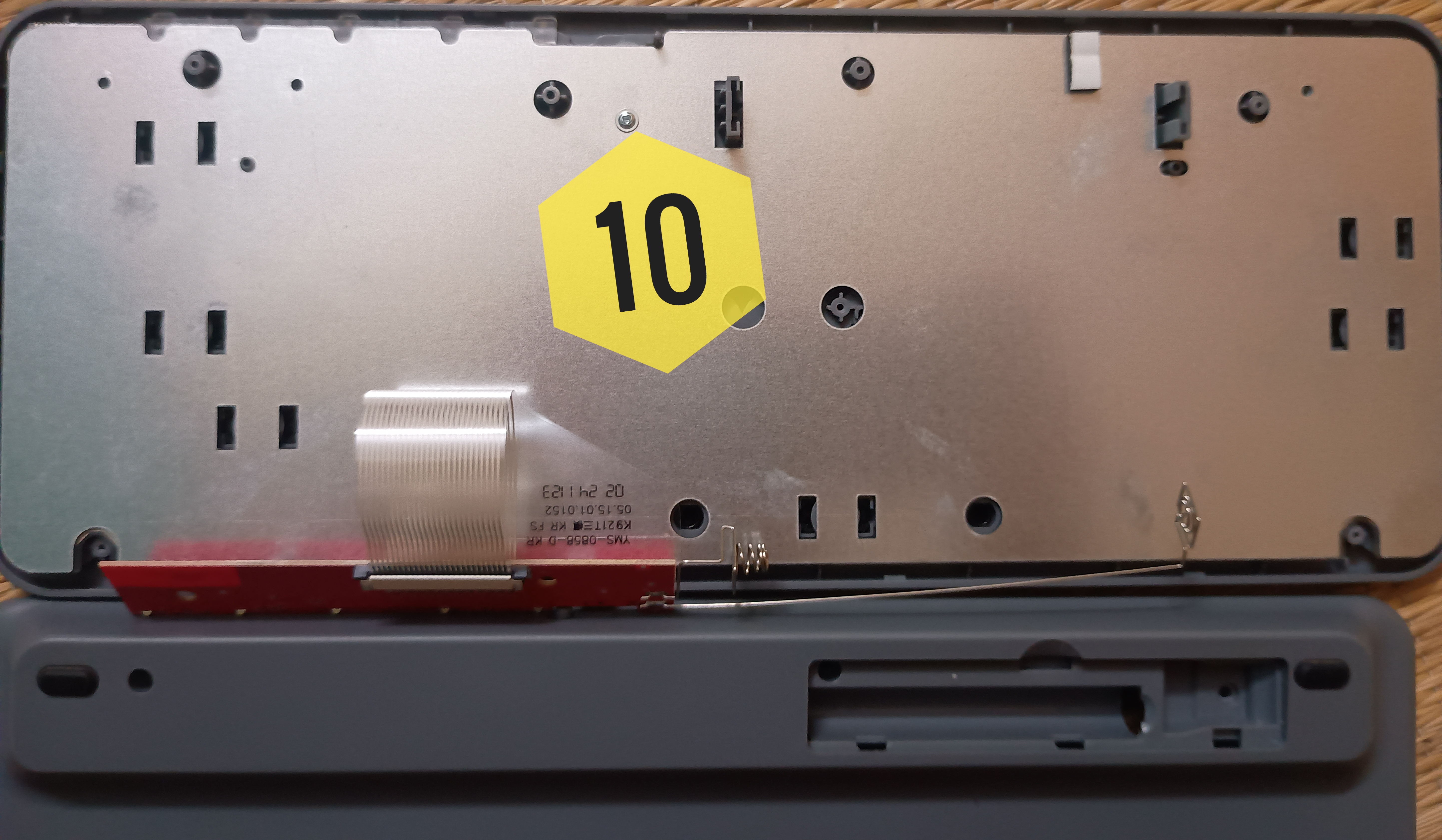 Marked position of screw 10 inside the Portronics Bubble 2 keyboard